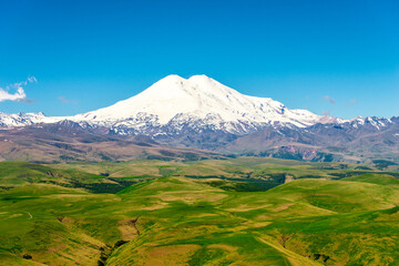Picturesque view of the white peak of Mount Elbrus. View from the Kanjol plateau