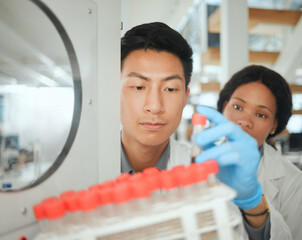 Scientist, test tube and incubator in lab for storage, collaboration and virus with innovation...