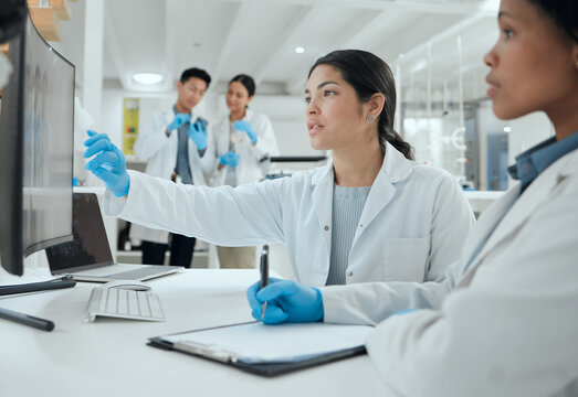 Laboratory, teamwork and doctors with computer for planning, feedback and discussion for treatment. Healthcare, scientists or women with clipboard for medical review, checklist and report information