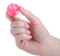 Female hand holding bouncy ball in hand on white background isolation
