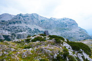 Beautiful a-frame mountain house shelter in the wilderness on the mountain