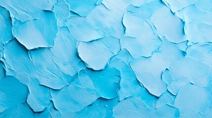 Obraz premium A tight shot of a blue wall with chipping paint on its edges