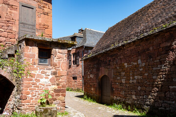 Collonges-la-Rouge village, one of the most beautiful villages in France with houses made from red stones, tourists destination in Dordogne