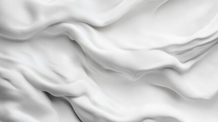 Fototapeta premium A close-up of a white fabric with a wavy texture Textured with white fabric