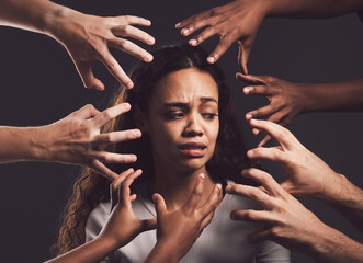 Woman, fear and paranoid with hands in anxiety, pain and mental health on dark background. Female...
