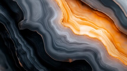Obraz premium A tight shot of an intricate, abstract background in black, orange, and white hues Its edges feature a undulating wavy design