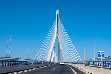 View on cable-stayed bridge with high pylons across the Bay of Cadiz, linking Cadiz with Puerto Real in mainland Spain