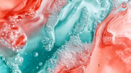 Obraz premium A tight shot of water bubbles on a red and teal mosaic, featuring a pink and blue color palette