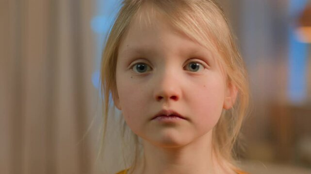Portrait little girl pensive upset serious Caucasian child kid offended daughter schoolgirl at home school problem sad innocence face abuse offense family custody crisis alone adopted orphan childcare
