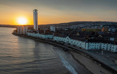 Editorial Swansea, UK - September 18, 2024: Sunset from a drone high above the marina area of Swansea in South Wales UK
