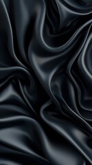   A close-up of a black fabric features a prominent wave pattern that appears very dark in the image
