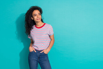 Photo portrait of lovely young lady look empty space posing dressed stylish striped garment isolated on cyan color background