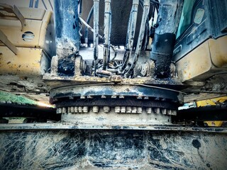 muddy crawler excavator heavy duty construction equipment at site full frame