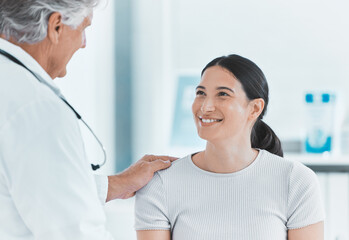 Checkup, woman and doctor in hospital, healthcare and greeting of patient, smile and gynecologist. Office, talking and diagnosis in clinic, treatment and advice for contraception and obstetrician