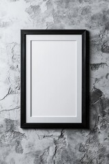 Black framed blank poster on concrete wall, modern interior design