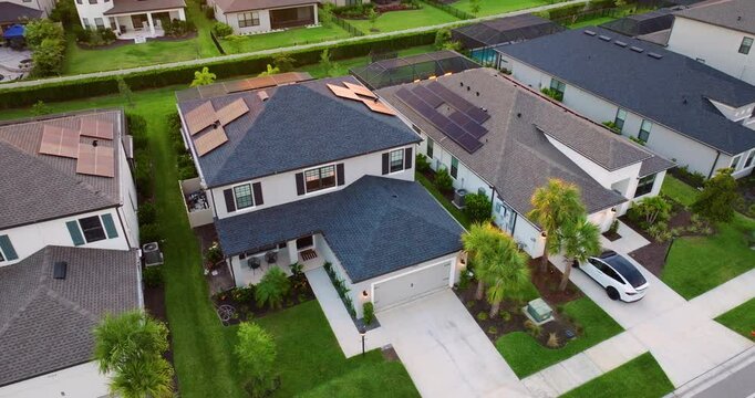 American gated community houses in rural US suburbs. View from above of large residential homes in small town in southwest Florida