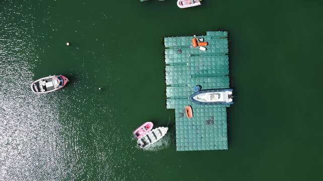 Top down aerial footage of the floating docks at Dun Laoghaire harbor in Dun Laoghaire, Ireland