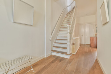 Bright hallway interior with elegant staircase