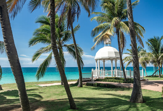 Serene Varadero beach with lush palms and gazebo