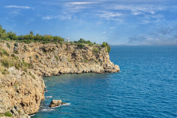 Touristic city of Antalya. Cliffs descending steeply to the sea and the view of the Mediterranean