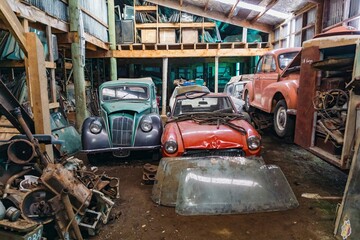 Abandoned cars and car parts in the The historical Horopito Motor Wreckers - Smash Palace, near Raetihi, Manawatu-Wanganui, New Zealand.