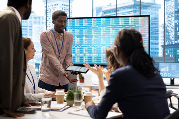 Stakeholders starting a fight during corporation meeting in boardroom, angry furious investors screaming at each other. Two people causing a scene in front of employees team, argument.