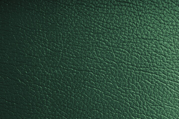 Natural, genuine green leather with metallic effect, texture of glossy leatherette background