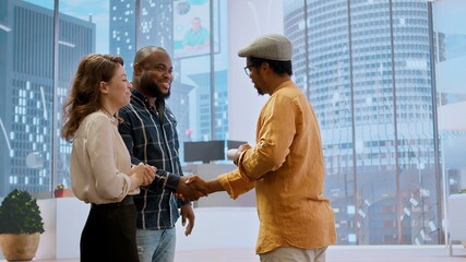 Clients and realtor on an office tour evaluating modern workspace design and discussing investment...