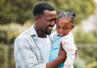 Fototapeta premium Happy, backyard and dad hug child for bonding, relationship and relax together in nature. Family, love and African father embrace girl outdoors for fun on weekend, holiday and vacation in park