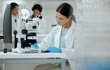 Scientist, study and woman with microscope in lab for medical experiment, pathogen and development. Science, pharmaceutical and biotech with sample for Mpox vaccine, innovation and epidemiology test