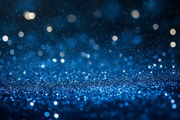 Abstract blue glitter background with bokeh lights.