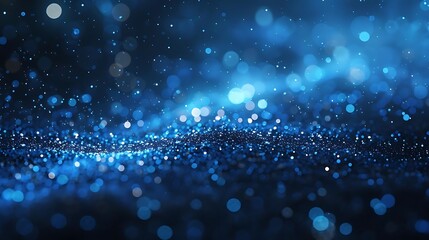 A shimmering blue abstract background with sparkling bokeh effects.
