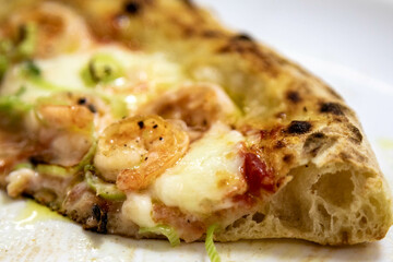 Rustic artisanal shrimp pizza with catupiry cheese and leeks