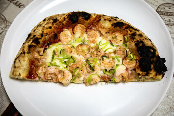 Rustic artisanal shrimp pizza with catupiry cheese and leeks
