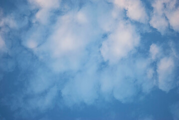 gentle white clouds in the blue sky