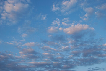 gentle white clouds in the blue sky