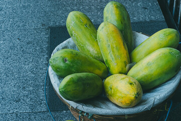 papaya offered by street vendors to buyers around Suryakencana, Bogor City, Indonesia