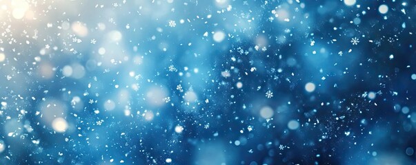 Beautiful bokeh effect with shimmering blue tones, perfect for backgrounds, designs, and festive themes.