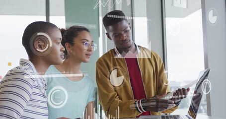 Image of financial data processing over diverse business people in office