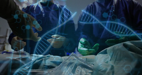 DNA strands and data processing image over surgeons performing operation