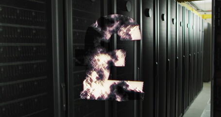 Pound sterling symbol with smoke effect image over server racks in data center