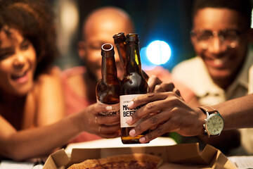 Happy friends, beer and hands toast at office party to celebrate project launch success. Alcohol, drink and African business people cheers for social gathering after deadline at night on Octoberfest
