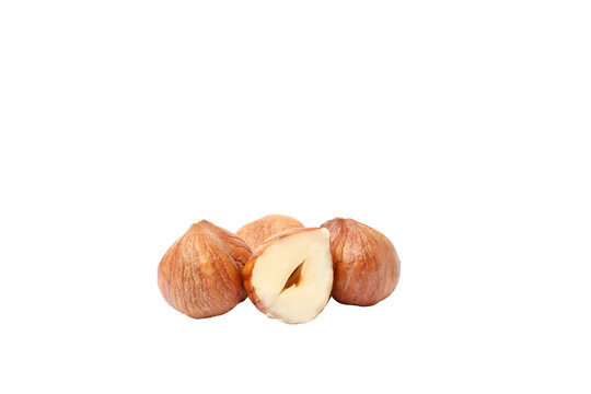 PNG, Peeled whole and half hazelnuts, isolated on white background