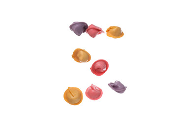 PNG, Colored dumplings on wooden skewers in hands, isolated on white background