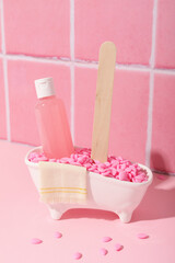 Decorative bath with wax granules for depilation