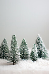 christmas tree with lights in the snow