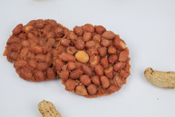 Thai Fried Peanut Cookies on white background. Deep Fried Bean cookies peanut crackers made from nuts and flour to fry.