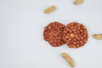 Thai Fried Peanut Cookies on white background. Deep Fried Bean cookies peanut crackers made from nuts and flour to fry.