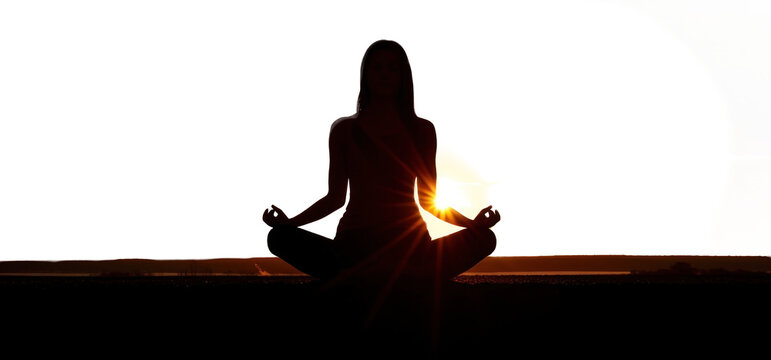 PNG  Backlighting silhouette meditating sunset.