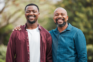 Black family, portrait and nature hug with man, relax and together for love in relationship. Happy people, father and son in embrace for support in connection, trust and travel to Nigeria for peace